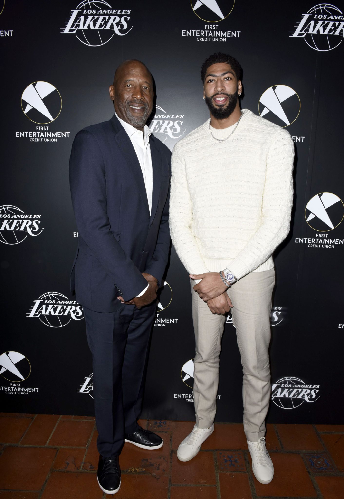 LOS ANGELES, CALIFORNIA - MARCH 4: Lakers legend James Worthy and  Lakers star Anthony Davis attend the First Entertainment x Los Angeles Lakers and Anthony Davis Partnership Launch Event at The Theatre at Ace Hotel on March 4, 2020 in Los Angeles, California.  (Photo by Vivien Killilea/Getty Images for First Entertainment)